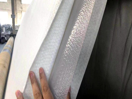 「短絲」兩布一膜複合土工膜